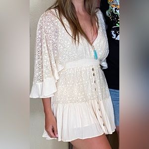 Ivory Vici Romper wing sleeves
